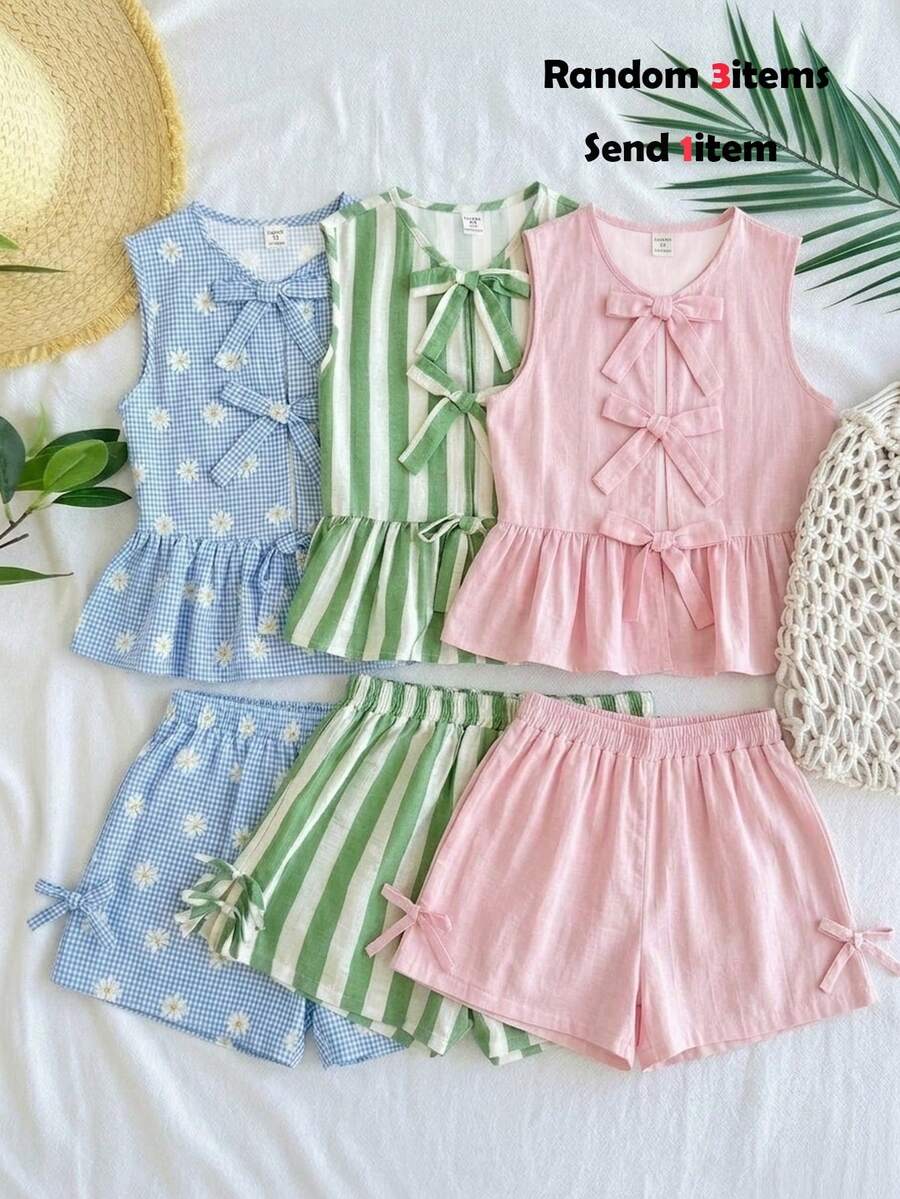Tween girls green and white striped 2-piece summer set featuring a sleeveless bowknot ruffle crop top and casual shorts.