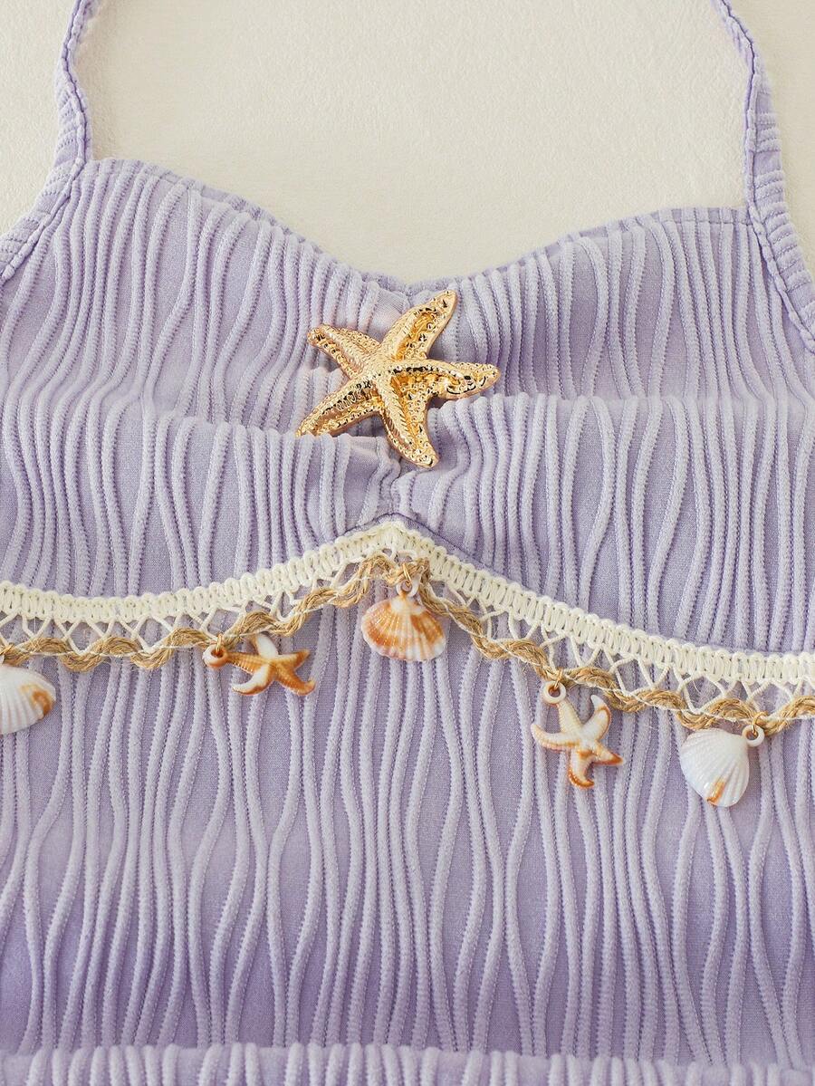 Tween girls apricot sleeveless halter mini dress with textured starfish and shell decor, shirred tiered layer, high waist, and flounce hem.