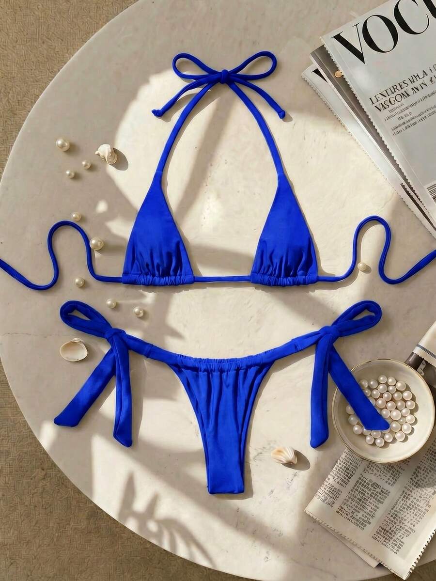 Army green high waist micro bikini swimsuit set for women featuring wireless spaghetti strap top with chain knot details and tie side thong bottoms.