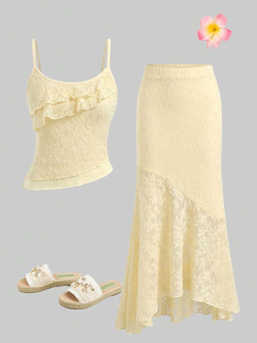 Tween girls blue 2-piece set featuring a short spaghetti strap lace tank top with asymmetrical lettuce trim and a long matching skirt.