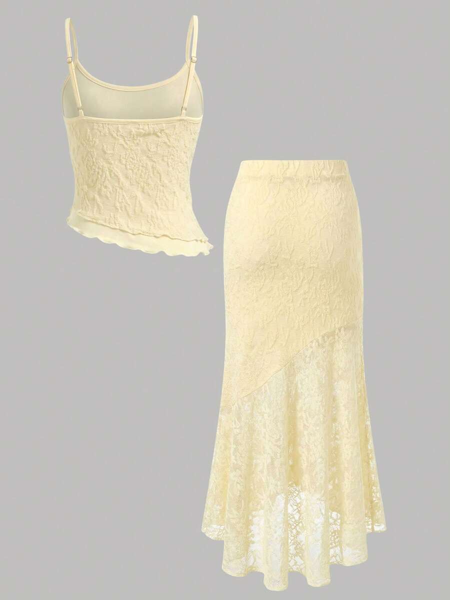 Tween girls blue 2-piece set featuring a short spaghetti strap lace tank top with asymmetrical lettuce trim and a long matching skirt.