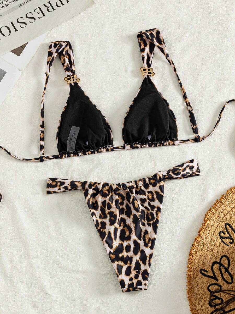 Women's multicolor high waist bikini set with textured pattern, knot details, wireless triangle bra top, and high cut bottoms.