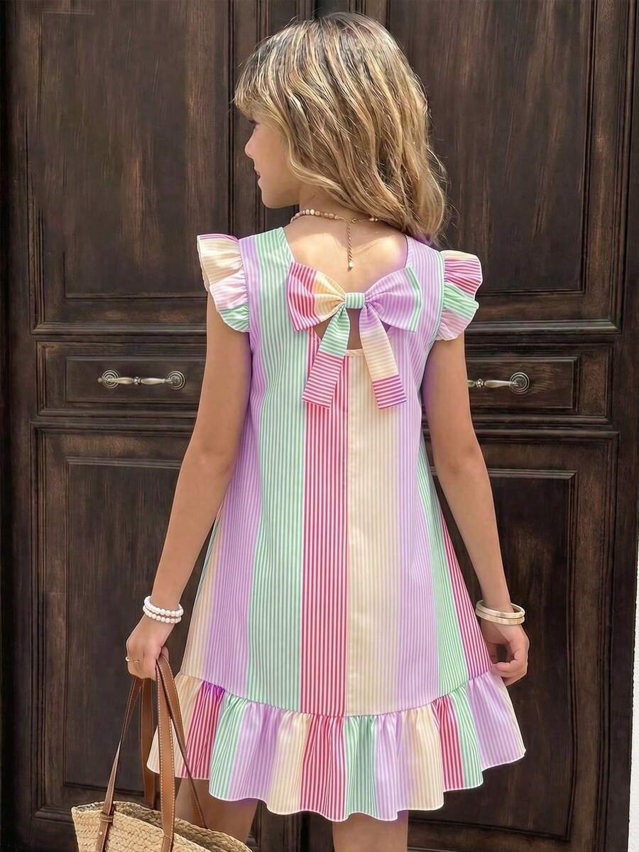 Tween girls apricot vacation midi dress featuring a round neck, cut out details, ruffle flounce accents, and geometric pattern.