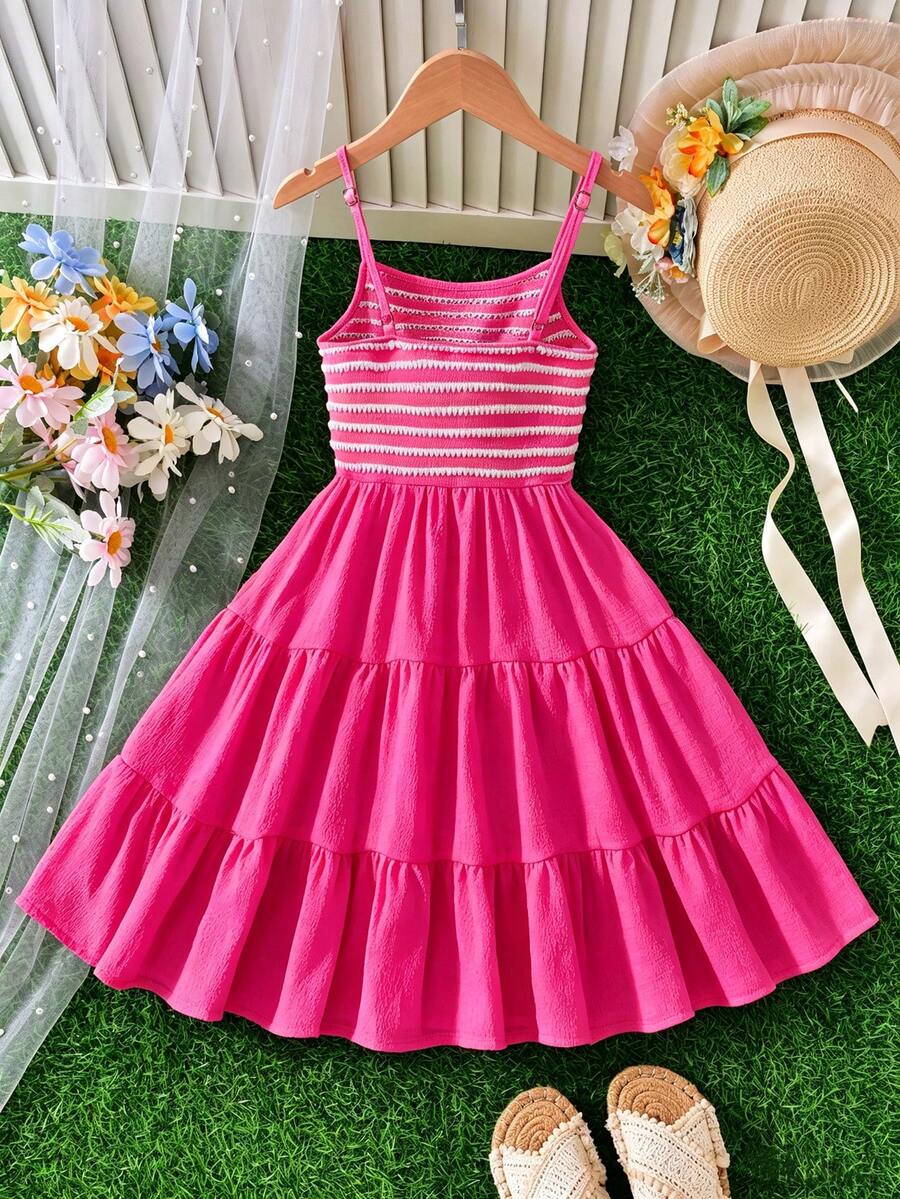 Tween girls yellow sleeveless cami dress with spaghetti straps, high waist, tiered layered skirt, shirred detail, zipper closure, and casual vacation style.