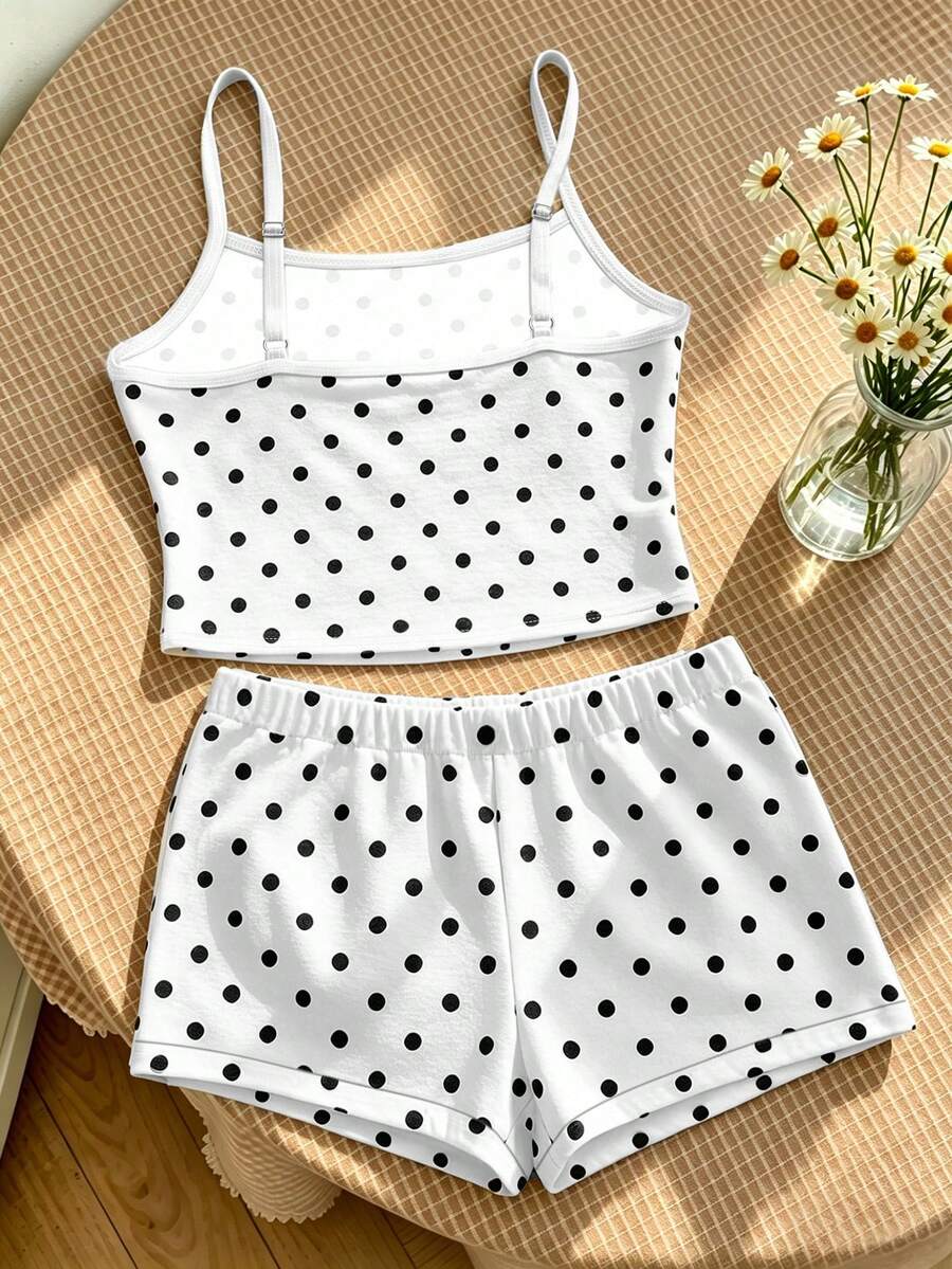 Tween girls summer 2-piece Hawaiian style outfit featuring a graphic print spaghetti strap camisole top with contrast piping and matching casual shorts.