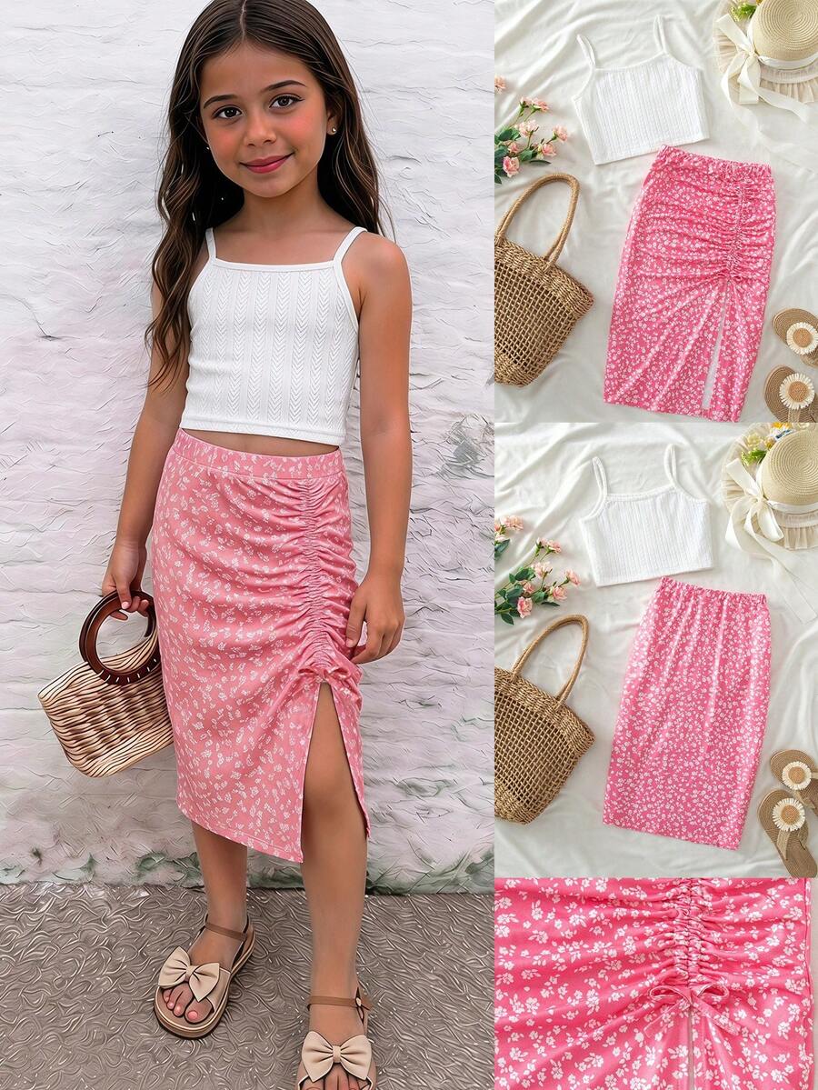 Tween girl wearing a 2-piece set featuring a black rib-knit spaghetti strap camisole top and a ruched leopard print midi skirt.