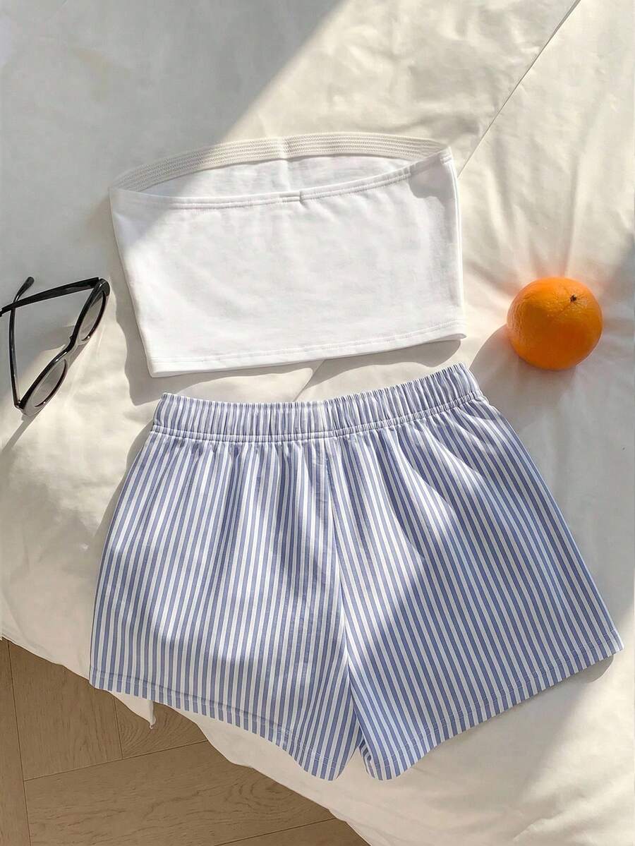 Tween girls two-piece summer outfit featuring a brown strapless tube top with contrast pink tape accent and matching brown shorts with pockets.