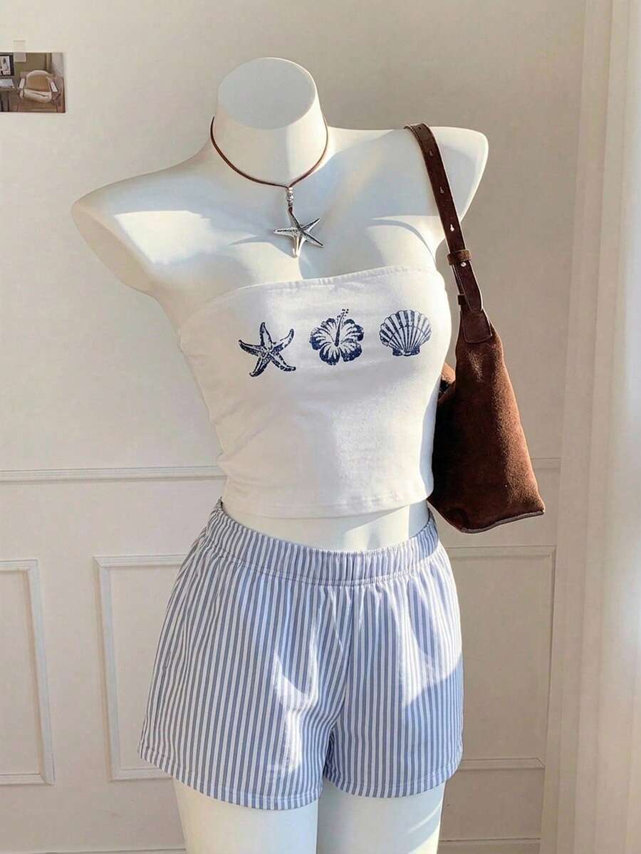 Tween girls two-piece summer outfit featuring a brown strapless tube top with contrast pink tape accent and matching brown shorts with pockets.