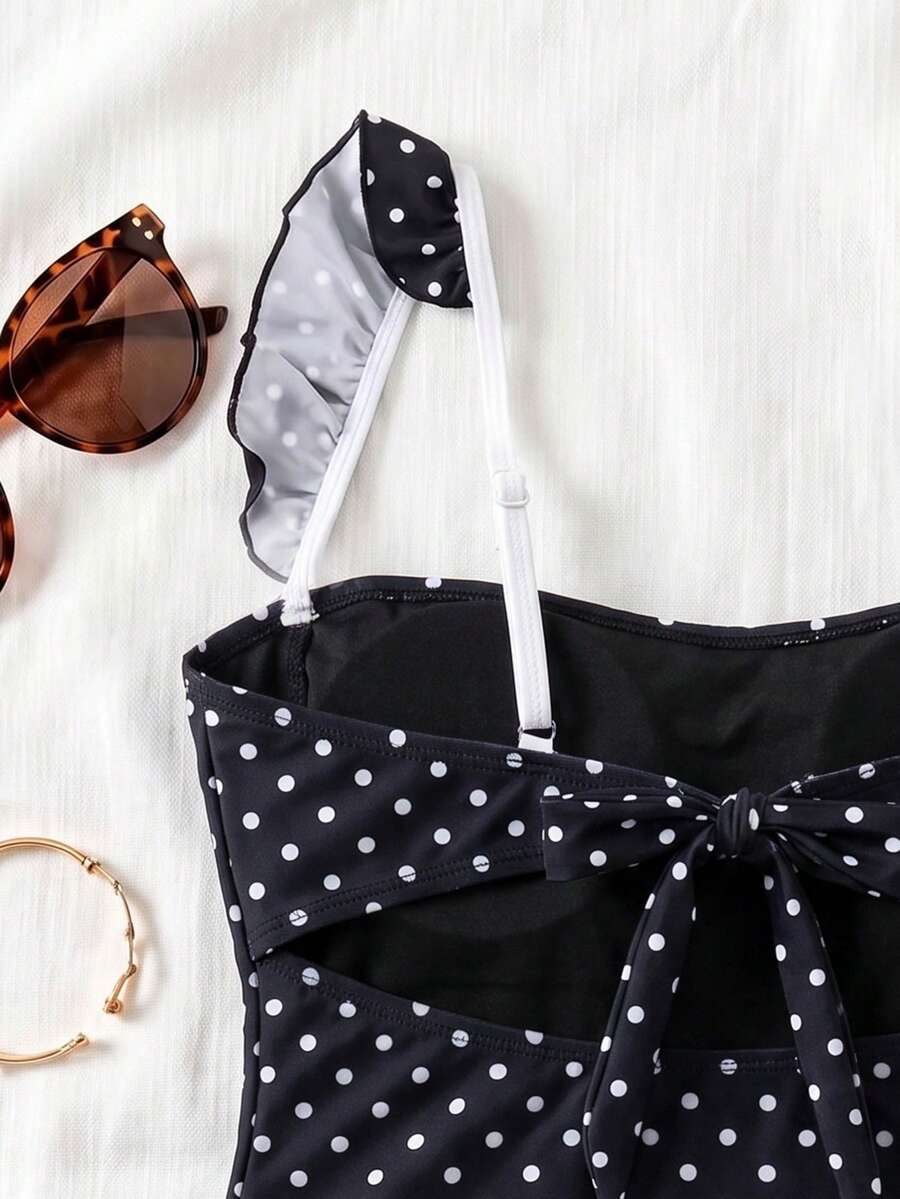 Black colorblock women's one-piece swimsuit with spaghetti straps and high stretch fabric.