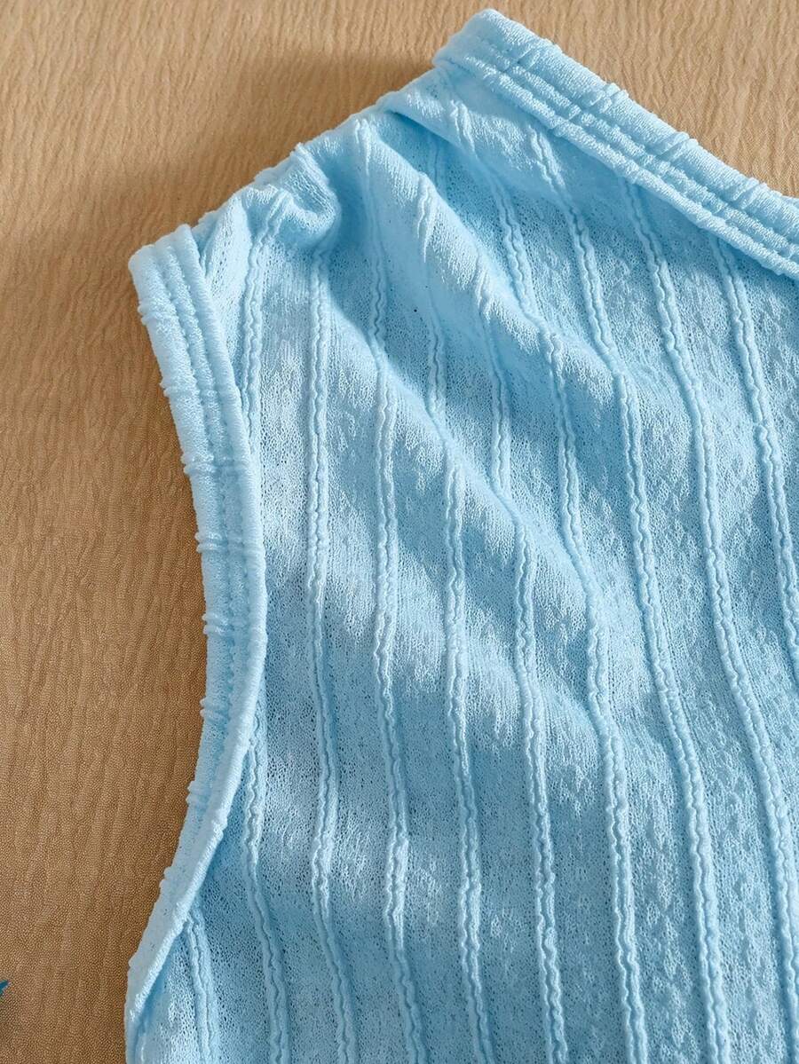 Light blue two-piece outfit set for tween girls with a sleeveless round neck vest top and a tiered ruffle cake skirt featuring a plant pattern.