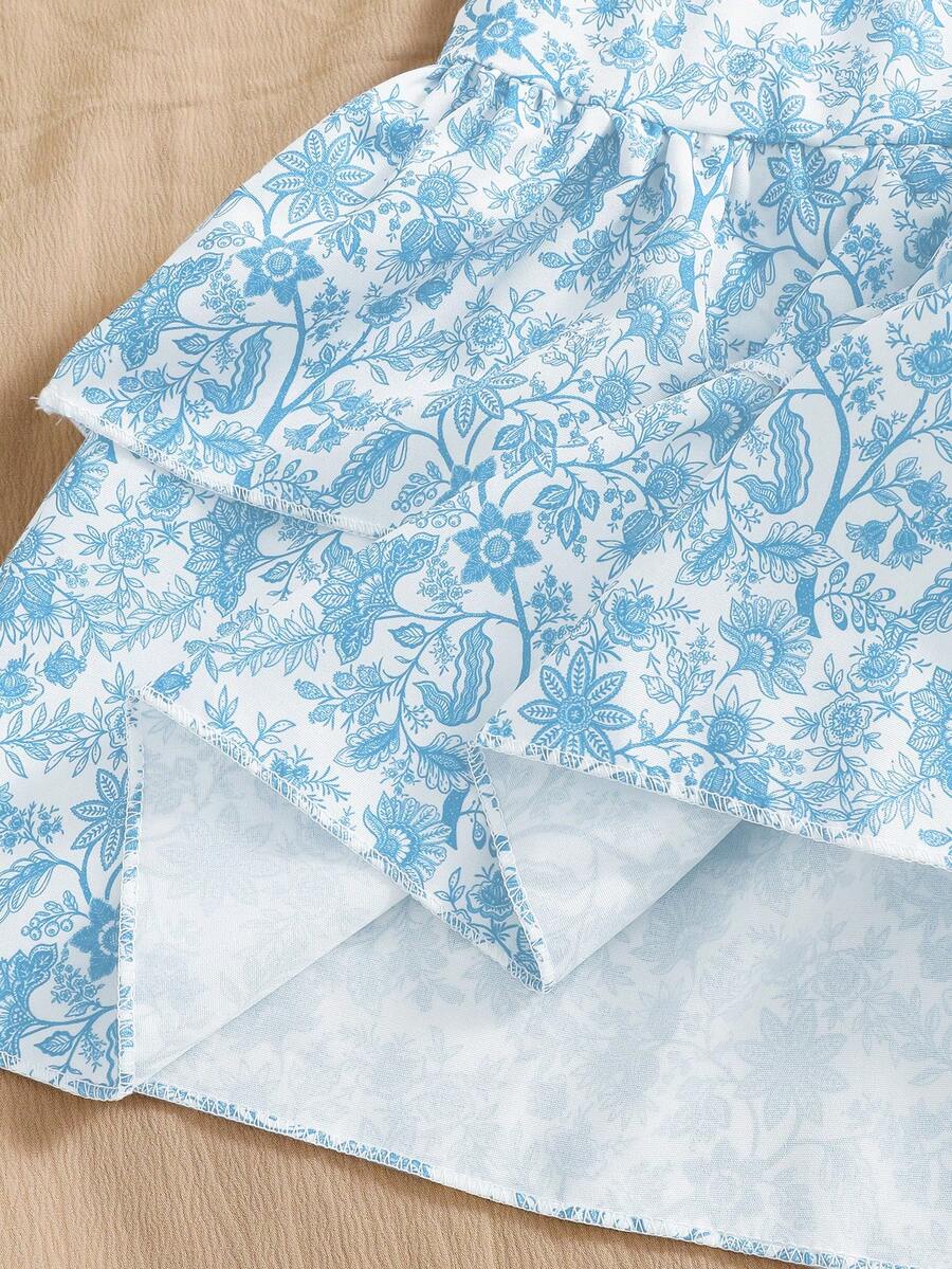 Light blue two-piece outfit set for tween girls with a sleeveless round neck vest top and a tiered ruffle cake skirt featuring a plant pattern.