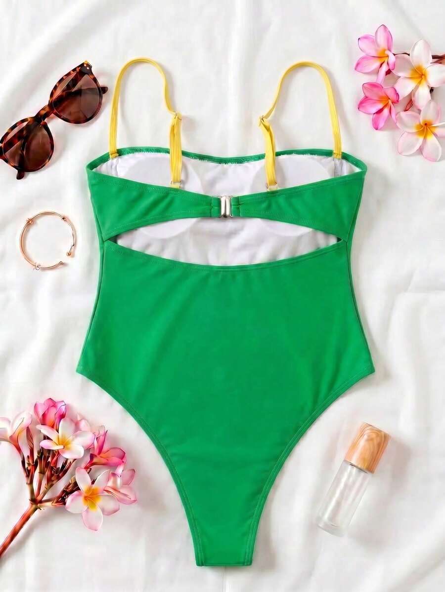 Black colorblock women's one-piece swimsuit with spaghetti straps and high stretch fabric.