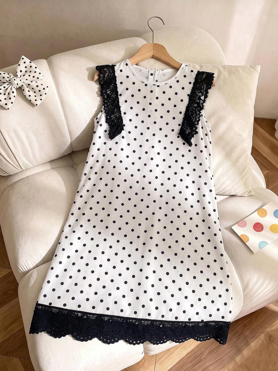 Tween girls apricot vacation midi dress featuring a round neck, cut out details, ruffle flounce accents, and geometric pattern.