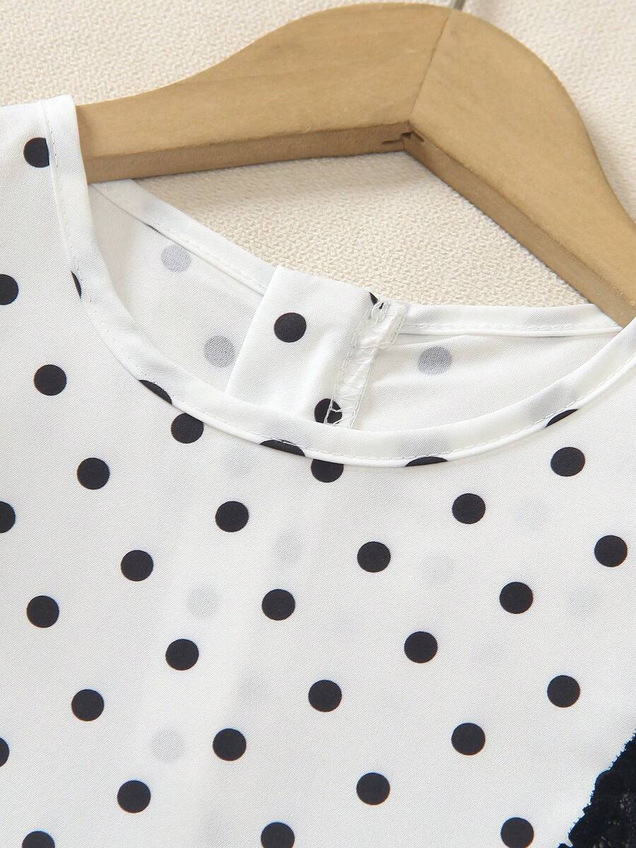 Tween girls apricot vacation midi dress featuring a round neck, cut out details, ruffle flounce accents, and geometric pattern.