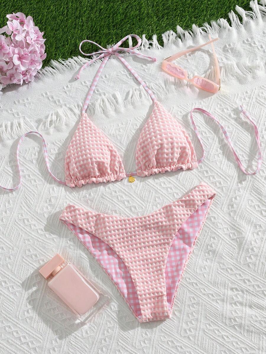 Women's black textured plaid 2-piece bikini set featuring a halter neckline, wireless triangle cups with removable padding, and mid-waist bottoms.