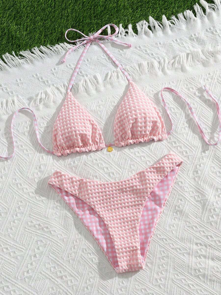 Women's black textured plaid 2-piece bikini set featuring a halter neckline, wireless triangle cups with removable padding, and mid-waist bottoms.