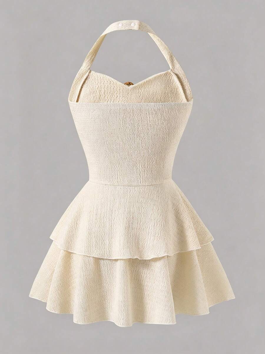 Tween girls apricot sleeveless halter mini dress with textured starfish and shell decor, shirred tiered layer, high waist, and flounce hem.