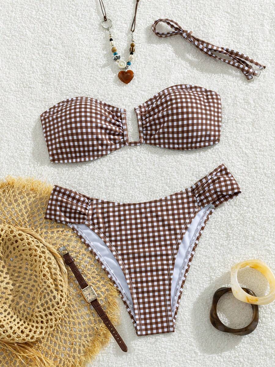 Brown and white small plaid two-piece bikini set featuring a strapless ruched bustier top with back tie and high-waist bottoms.