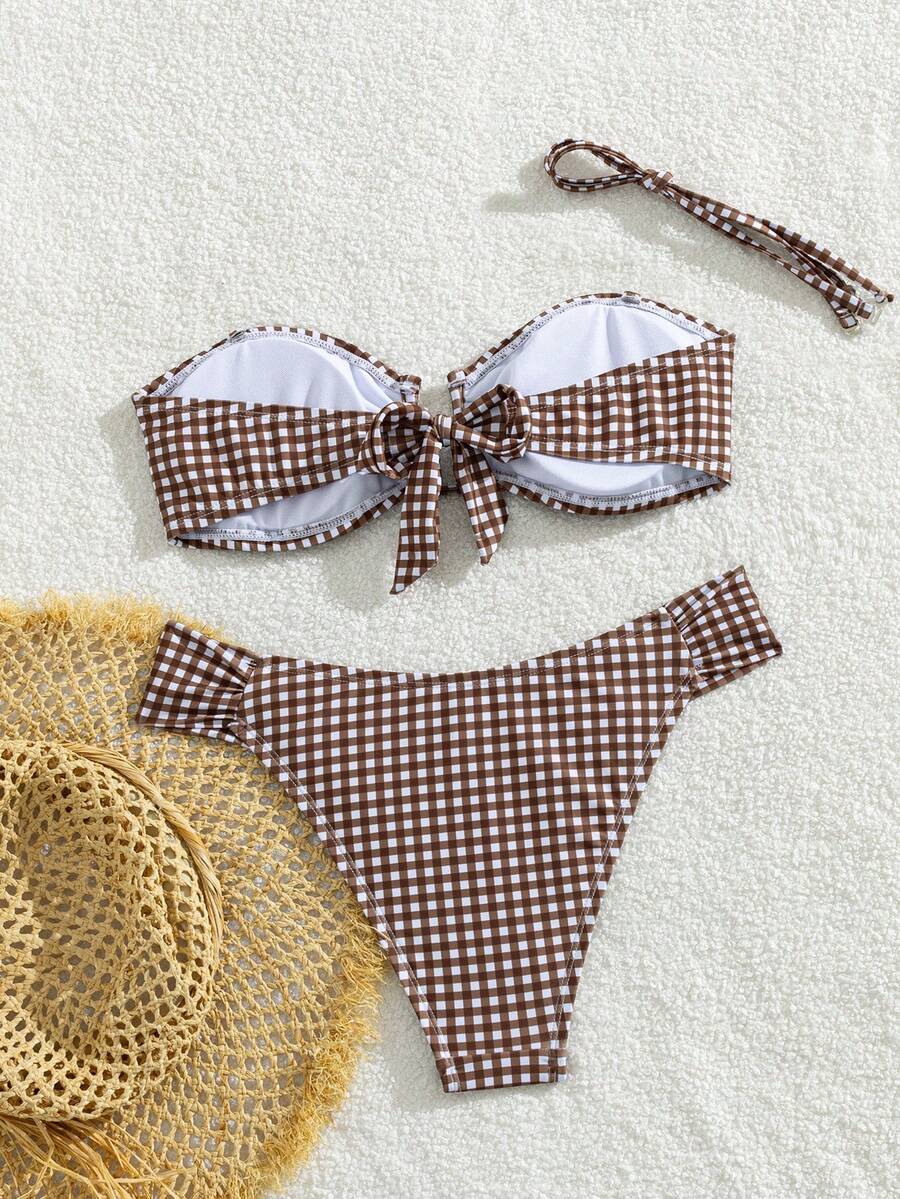 Brown and white small plaid two-piece bikini set featuring a strapless ruched bustier top with back tie and high-waist bottoms.