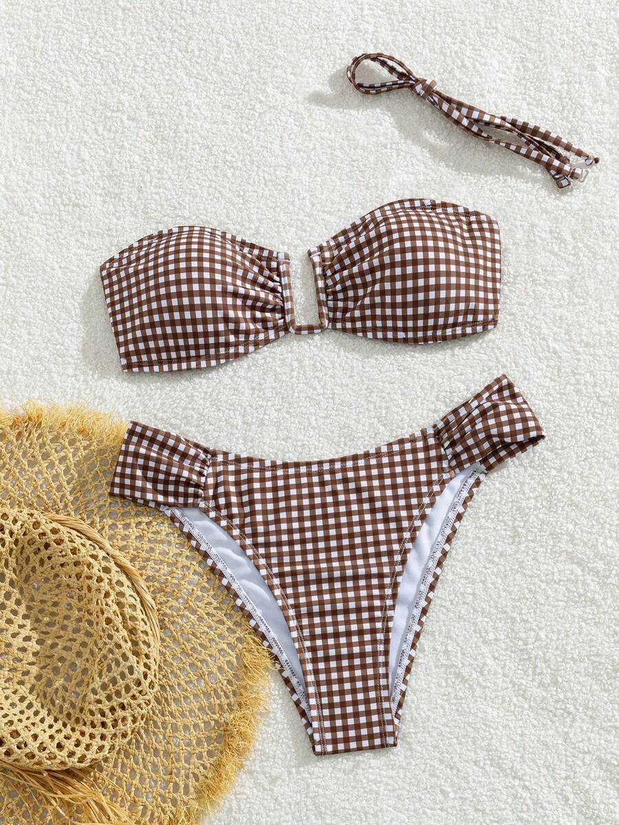 Brown and white small plaid two-piece bikini set featuring a strapless ruched bustier top with back tie and high-waist bottoms.