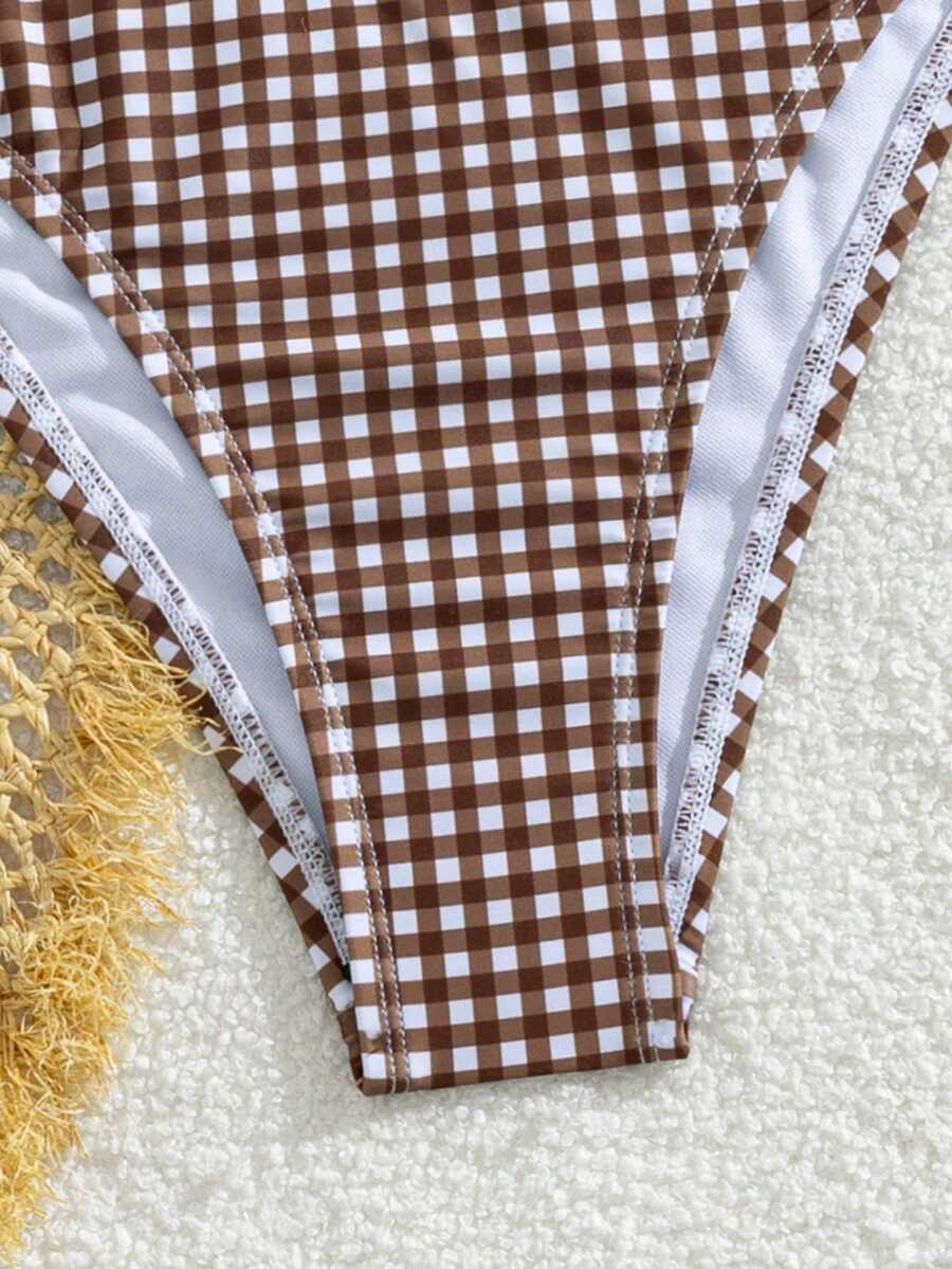 Brown and white small plaid two-piece bikini set featuring a strapless ruched bustier top with back tie and high-waist bottoms.