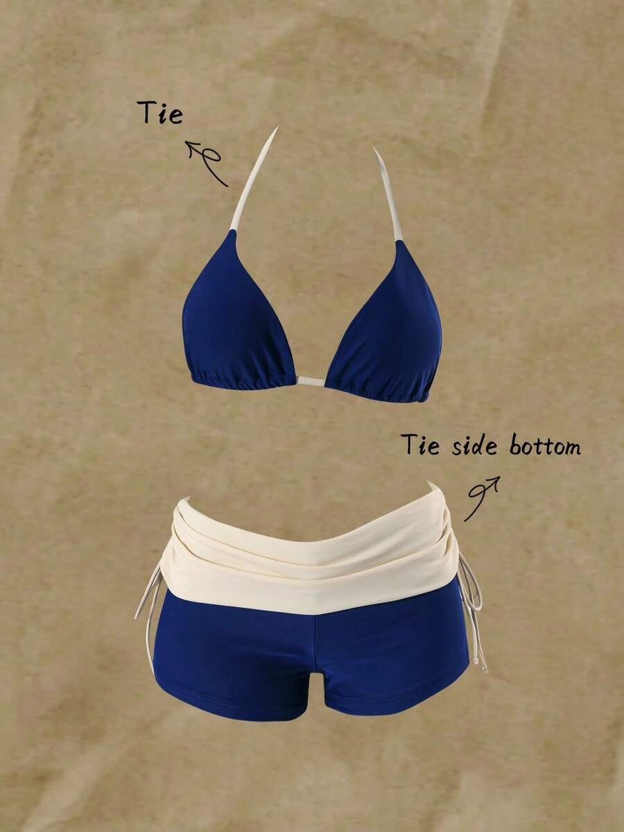 Women's halter triangle bikini top with knot detail paired with mid-waist colorblock swim shorts.