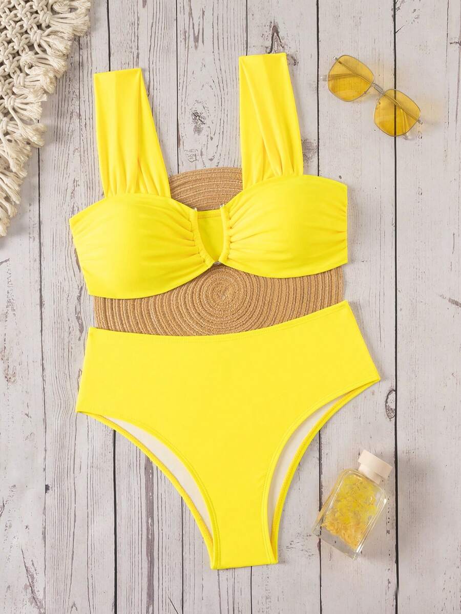 Springbreak black high waist bikini set for women featuring wireless bra top with ruffle lettuce trim and V-wired detail.