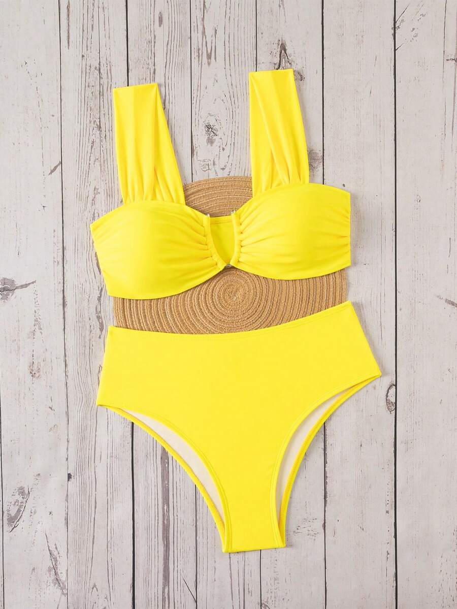 Springbreak black high waist bikini set for women featuring wireless bra top with ruffle lettuce trim and V-wired detail.