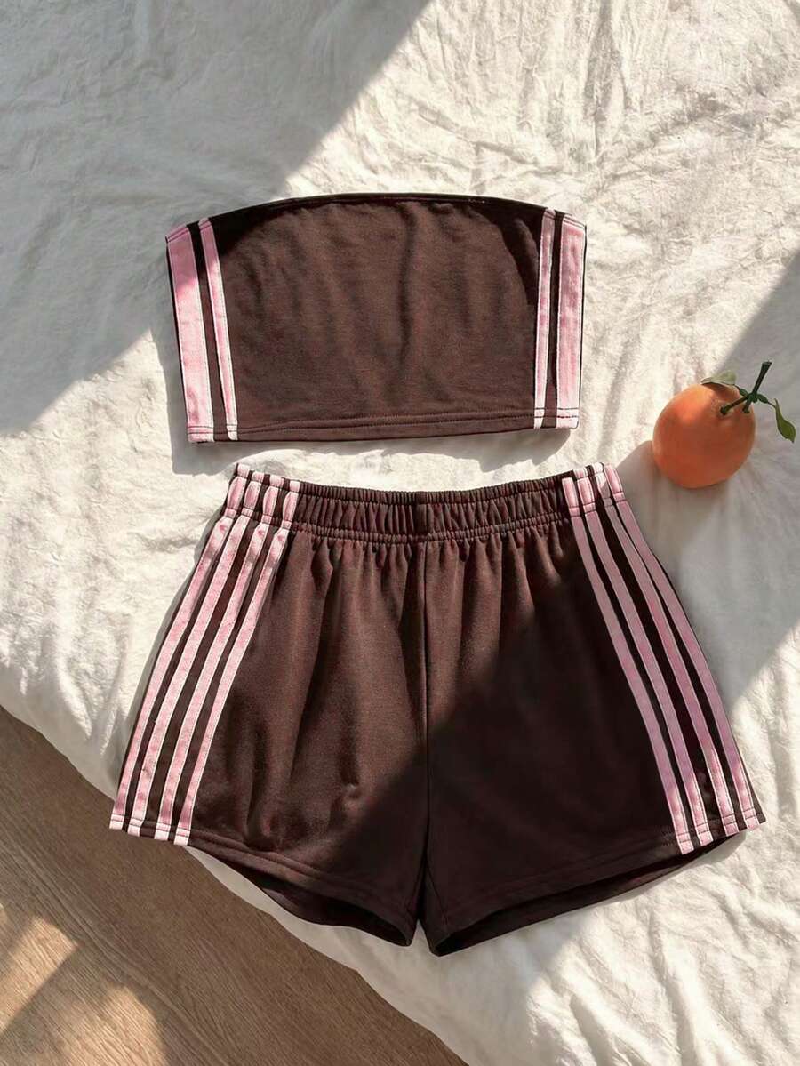 Tween girls two-piece summer outfit featuring a brown strapless tube top with contrast pink tape accent and matching brown shorts with pockets.