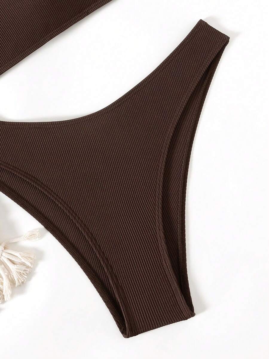 Apricot ribbed high waist two piece bikini swimsuit set for women featuring backless spaghetti strap top and high waisted bottoms.