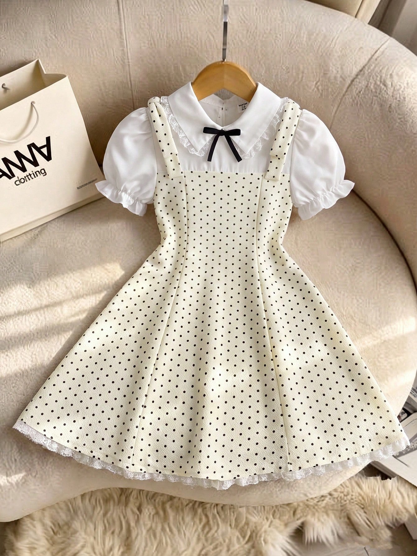 Tween girl blue and white striped A-line casual dress featuring round neck, puff short sleeves, high waist, and flounce ruffle hem.