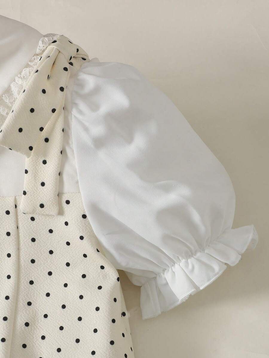 Tween girl blue and white striped A-line casual dress featuring round neck, puff short sleeves, high waist, and flounce ruffle hem.