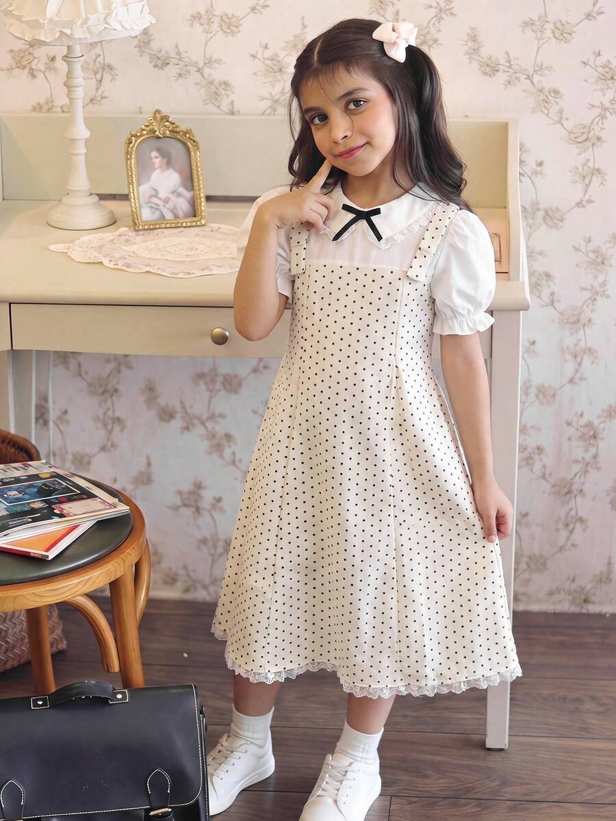 Tween girl blue and white striped A-line casual dress featuring round neck, puff short sleeves, high waist, and flounce ruffle hem.