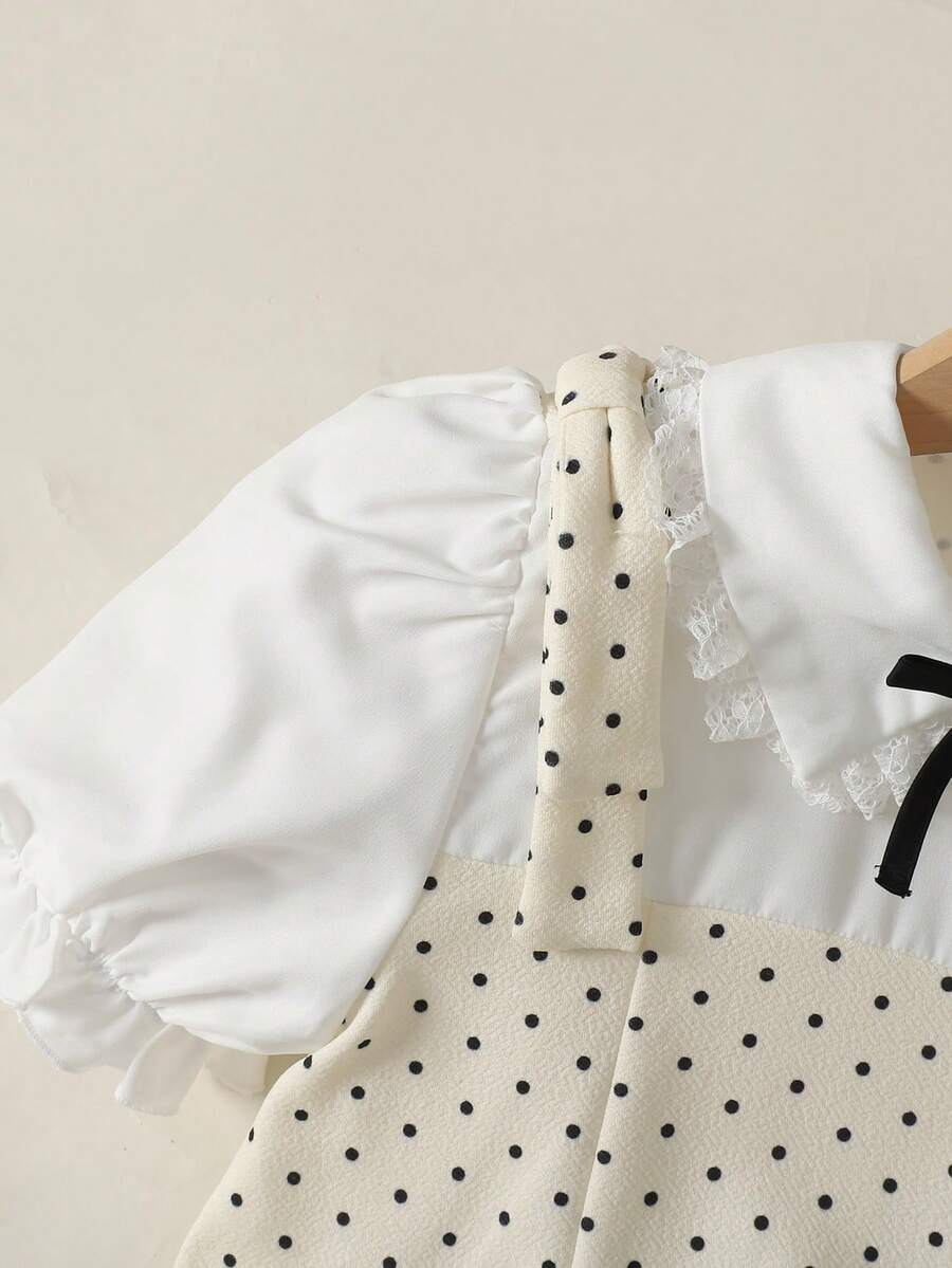 Tween girl blue and white striped A-line casual dress featuring round neck, puff short sleeves, high waist, and flounce ruffle hem.