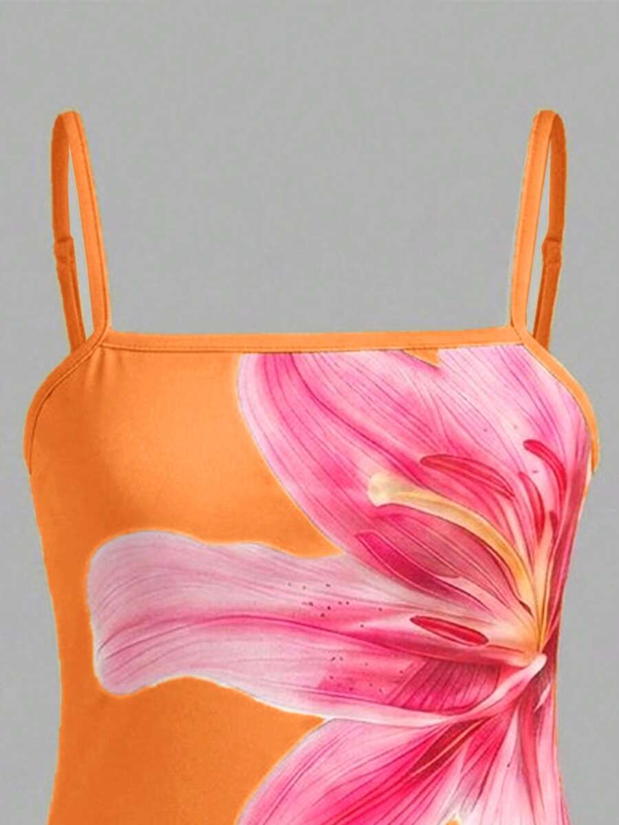 Tween girls multicolor floral midi cami dress with spaghetti straps, sleeveless design, loose fit, and vacation-inspired plant print.
