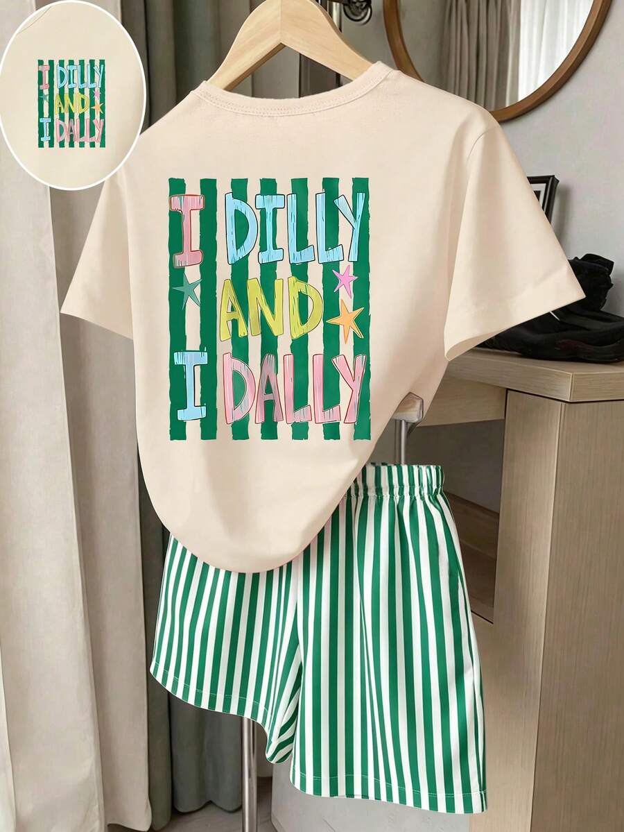 Girls' multicolor short sleeve T-shirt and shorts set featuring a cute cherry and bow print with round neck top and matching shorts.