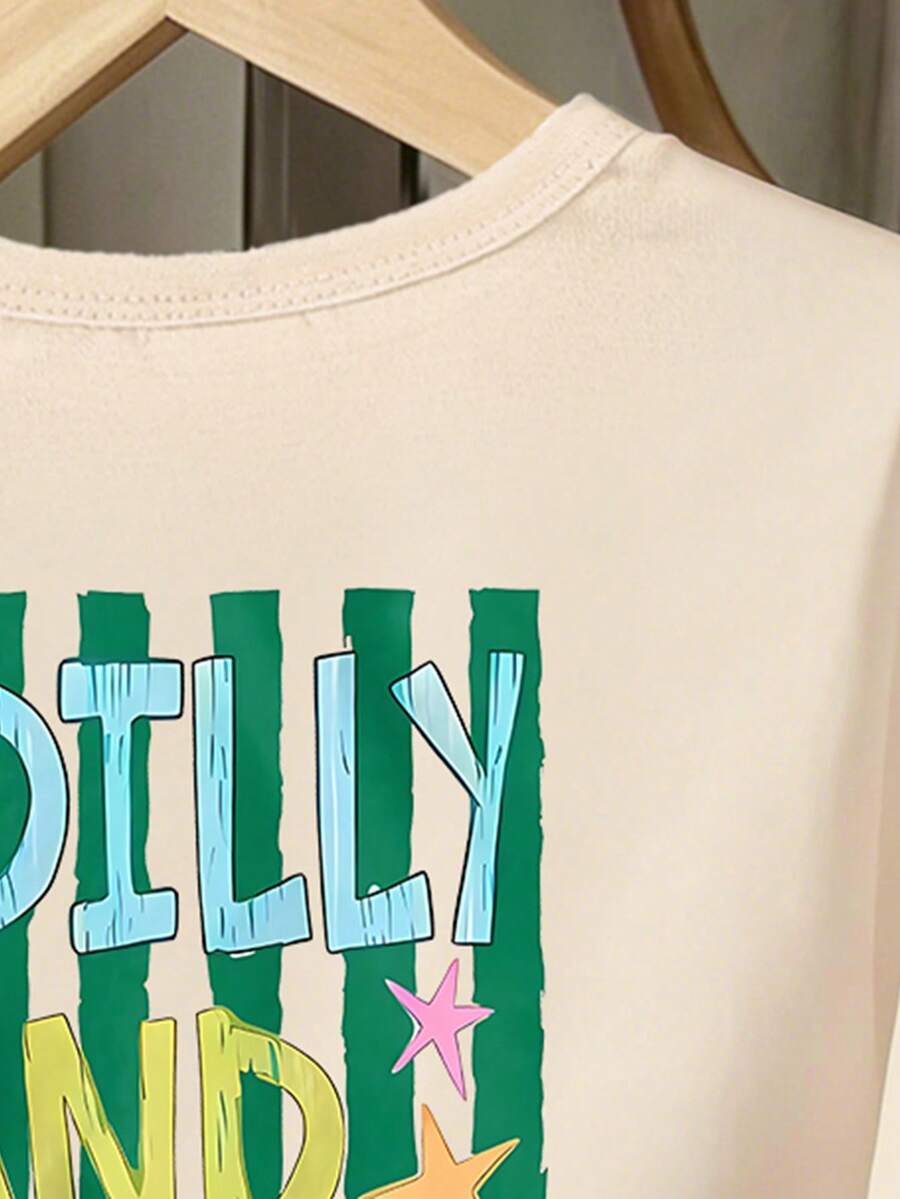 Girls' multicolor short sleeve T-shirt and shorts set featuring a cute cherry and bow print with round neck top and matching shorts.
