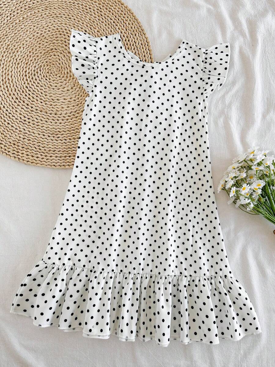 Tween girls apricot vacation midi dress featuring a round neck, cut out details, ruffle flounce accents, and geometric pattern.