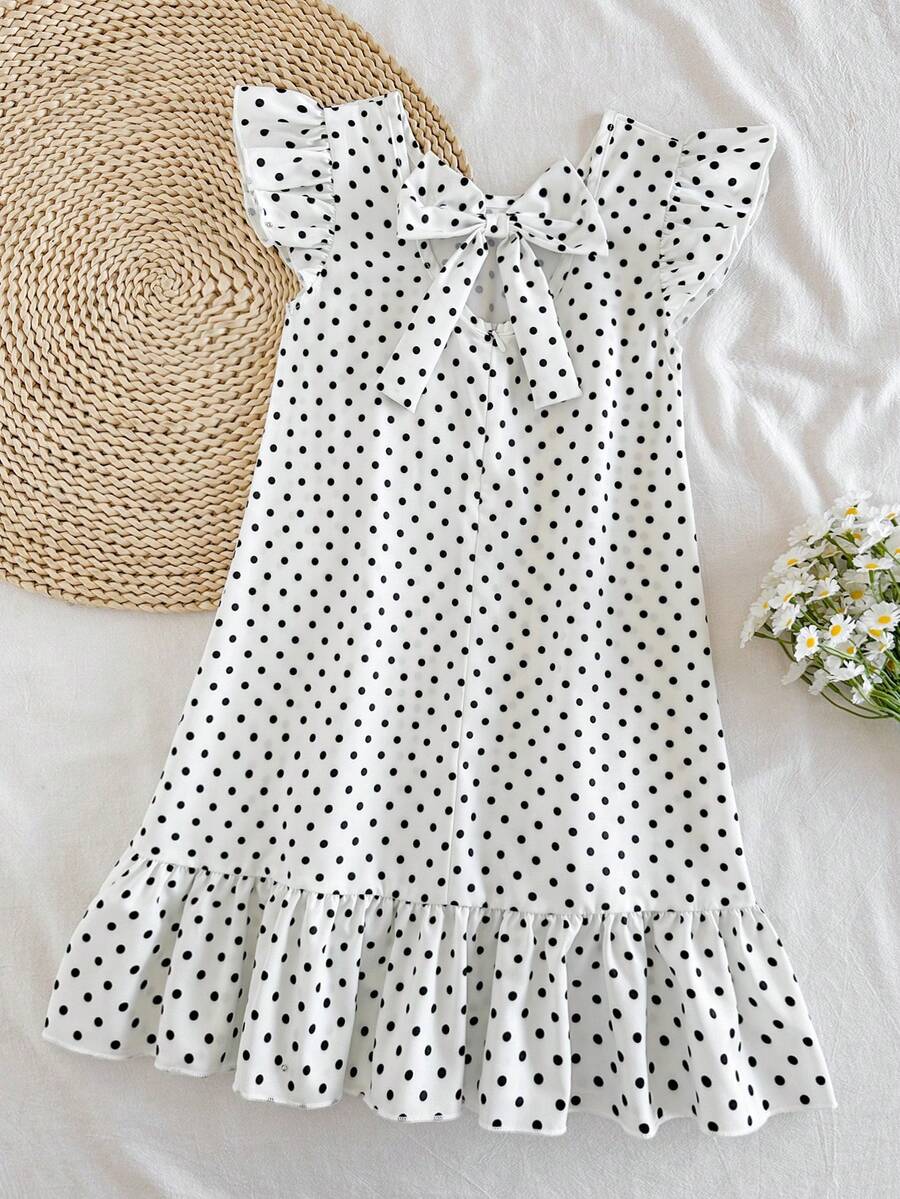 Tween girls apricot vacation midi dress featuring a round neck, cut out details, ruffle flounce accents, and geometric pattern.