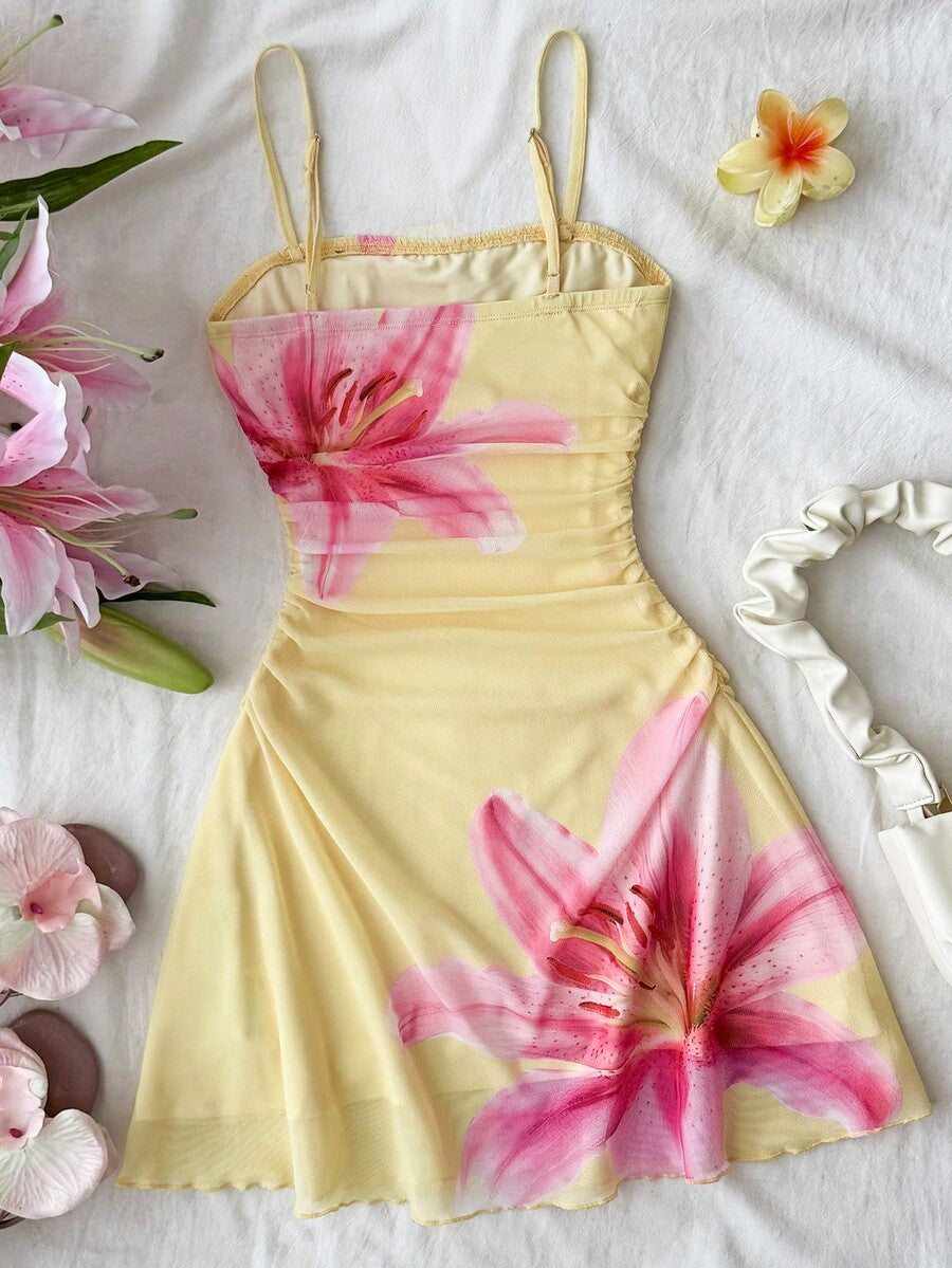 Yellow sleeveless tween girls cami dress with spaghetti straps, ruched bust, shirred details, high waist, and flared short A-line hem for vacation wear.