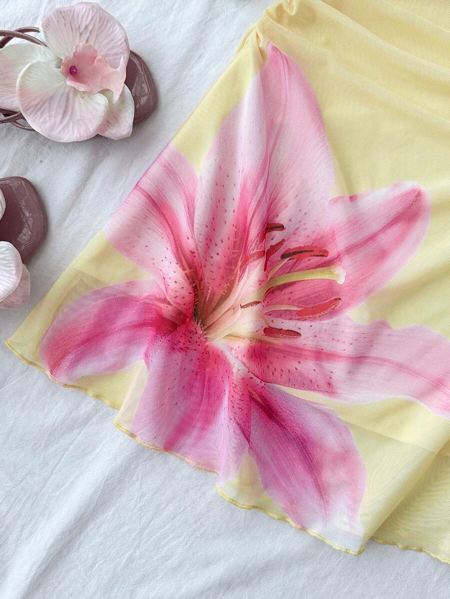 Yellow sleeveless tween girls cami dress with spaghetti straps, ruched bust, shirred details, high waist, and flared short A-line hem for vacation wear.