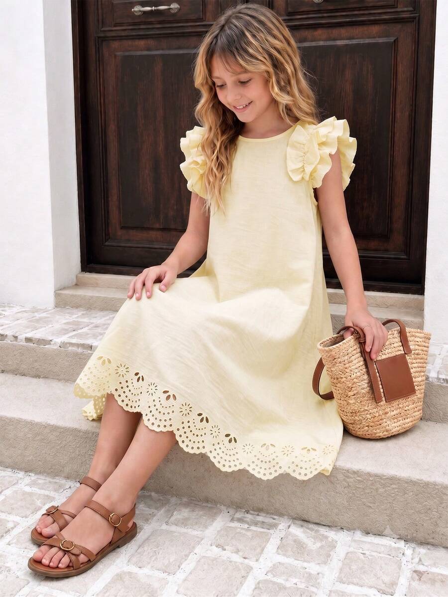 Tween girls apricot vacation midi dress featuring a round neck, cut out details, ruffle flounce accents, and geometric pattern.