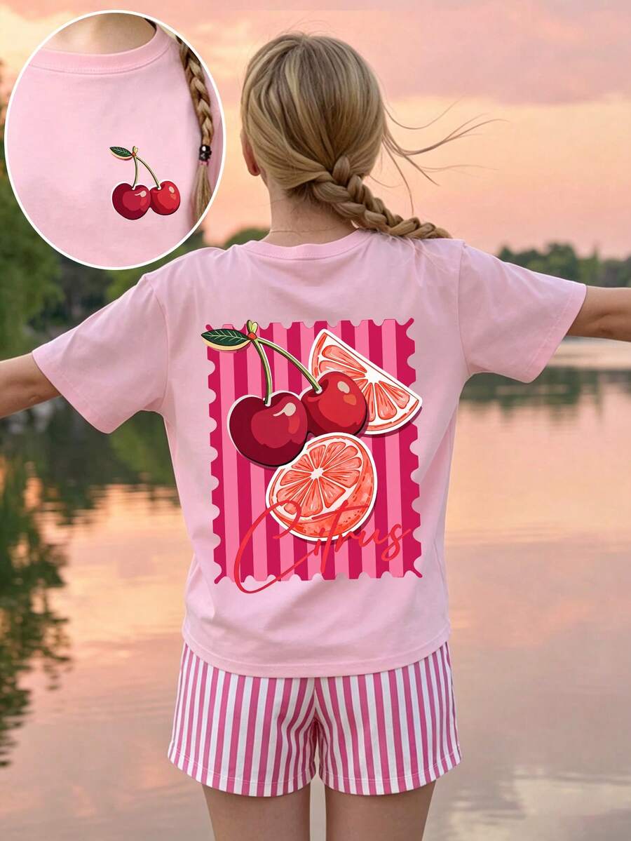 Girls' multicolor short sleeve T-shirt and shorts set featuring a cute cherry and bow print with round neck top and matching shorts.