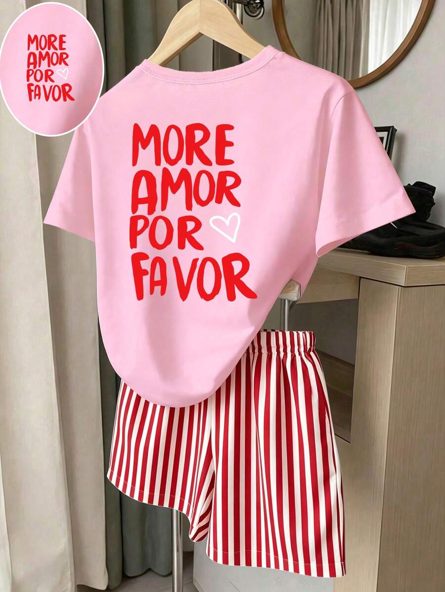 Girls' multicolor short sleeve T-shirt and shorts set featuring a cute cherry and bow print with round neck top and matching shorts.