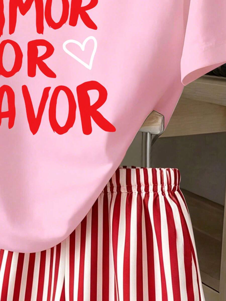 Girls' multicolor short sleeve T-shirt and shorts set featuring a cute cherry and bow print with round neck top and matching shorts.