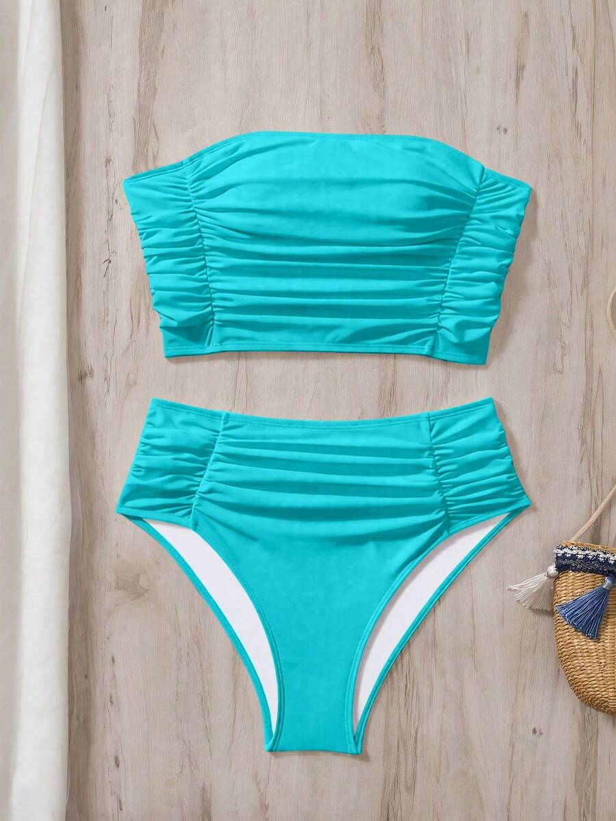 Women's black strapless ruched bandeau bikini top with high waisted bottoms