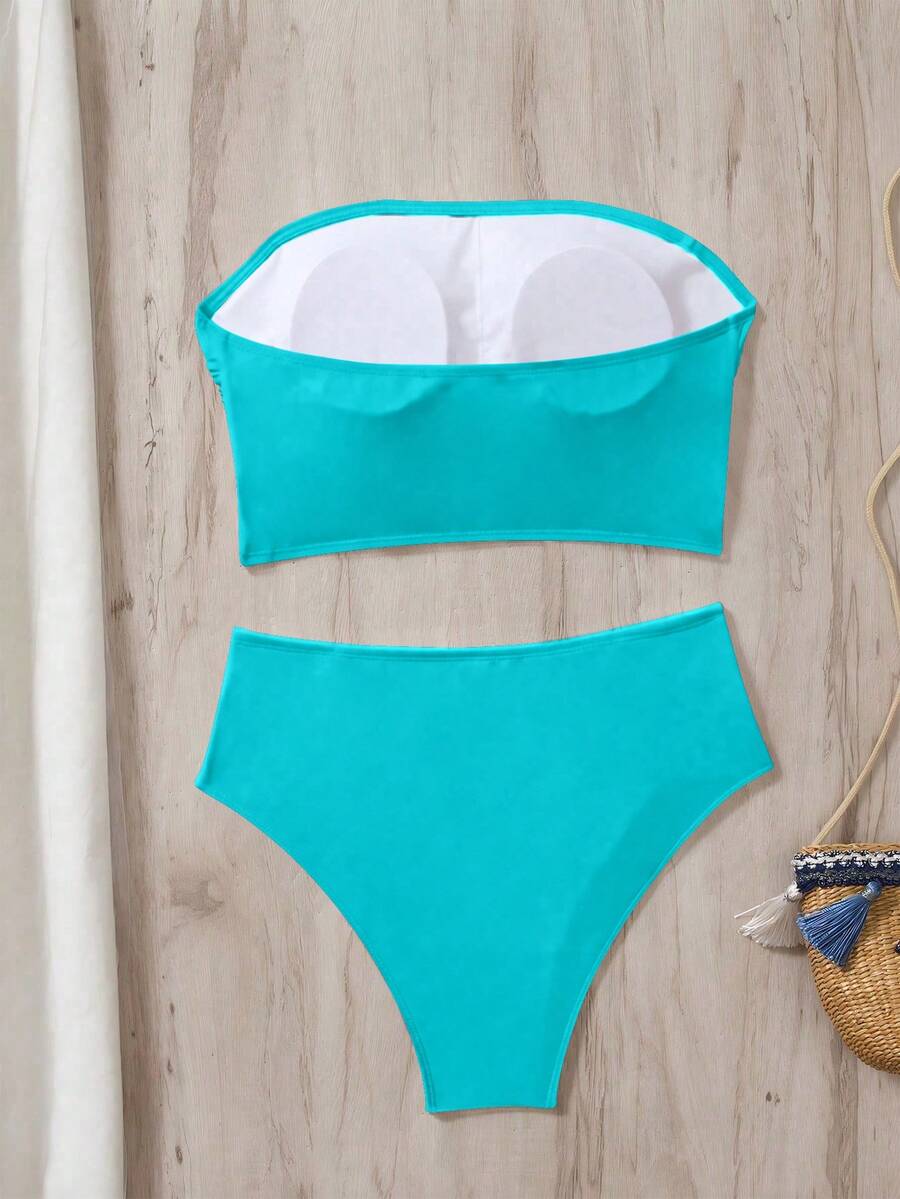 Women's black strapless ruched bandeau bikini top with high waisted bottoms
