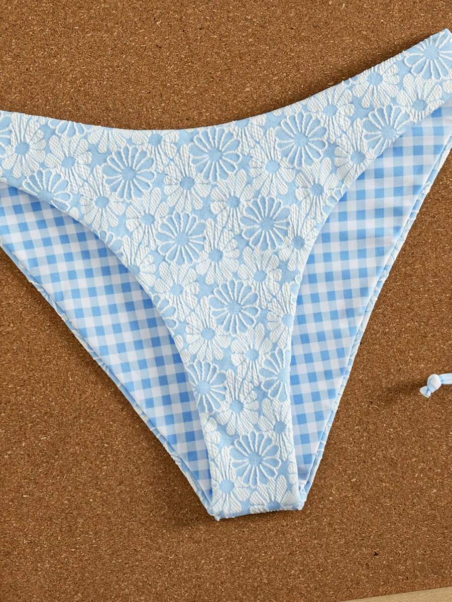 Women's black textured plaid 2-piece bikini set featuring a halter neckline, wireless triangle cups with removable padding, and mid-waist bottoms.