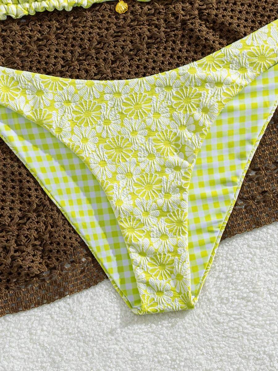 Women's black textured plaid 2-piece bikini set featuring a halter neckline, wireless triangle cups with removable padding, and mid-waist bottoms.