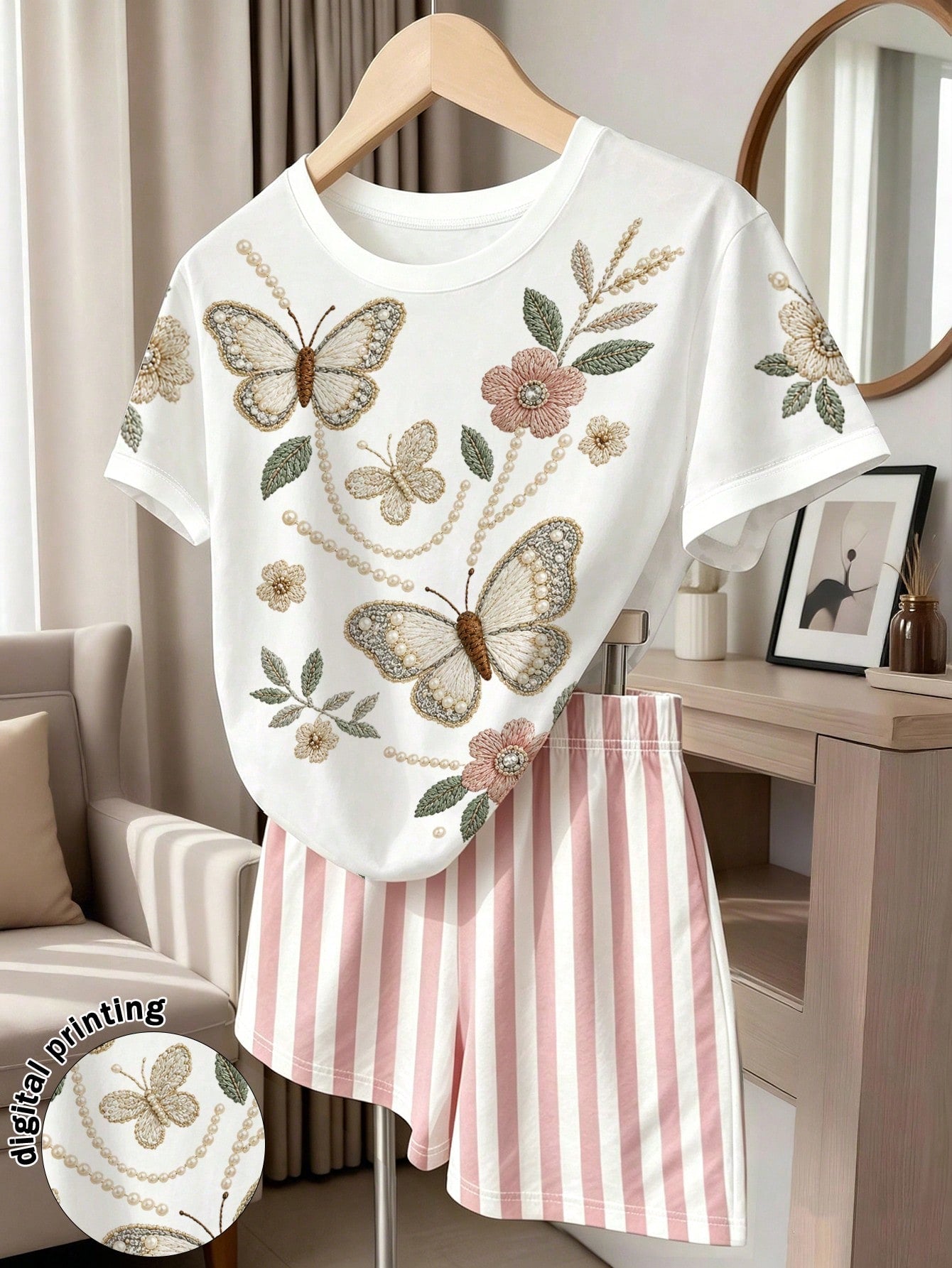 Girls' multicolor short sleeve T-shirt and shorts set featuring a cute cherry and bow print with round neck top and matching shorts.